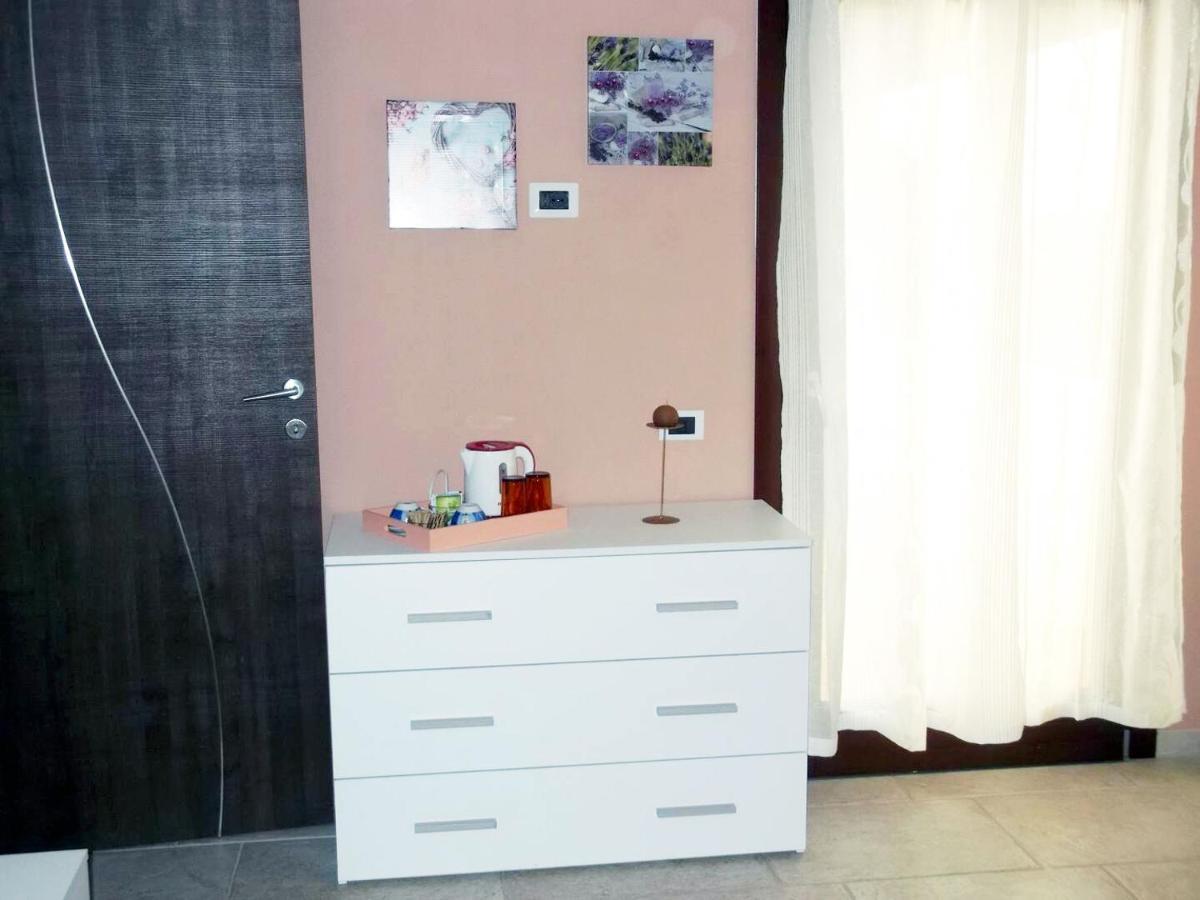 Casa Vacanze Menta Fiorita Флумини-ди-Кварту Экстерьер фото